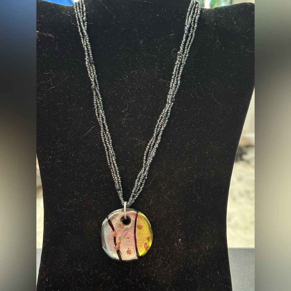 Gold and Silver Artistic Pendant Necklace